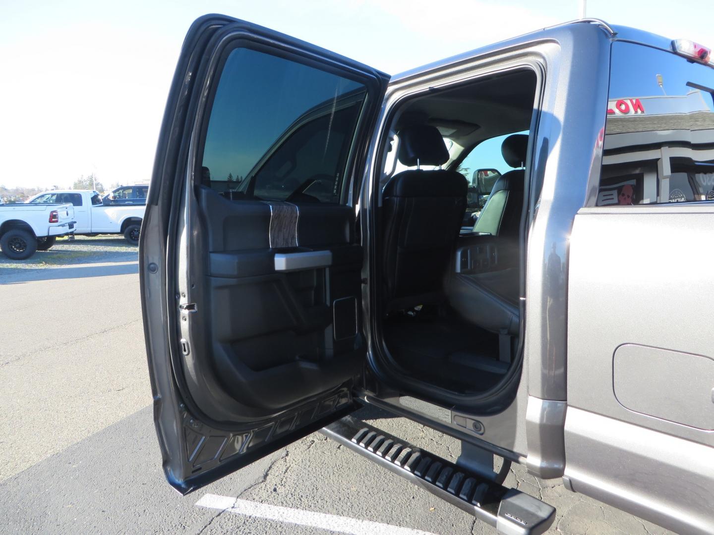 2019 CHARCOAL /BLACK Ford F-350 SD Lariat Crew Cab 4WD (1FT8W3BT7KE) with an 6.7L V8 OHV 16V DIESEL engine, 6A transmission, located at 2630 Grass Valley Highway, Auburn, CA, 95603, (530) 508-5100, 38.937893, -121.095482 - Leveled Superduty sitting on 20" XD series wheels, 35" Nitto Ridge Grappler tires, window tint, and has Firestone Air bags. - Photo#35